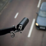 CCTV pointing on car - view from above, blurred background